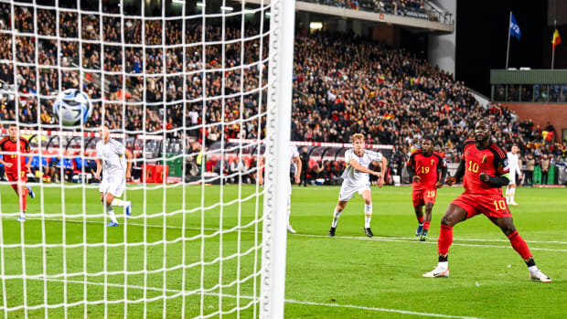 Romelu Lukaku pictured (right) converting a penalty kick to score for Belgium against Sweden in October 2023